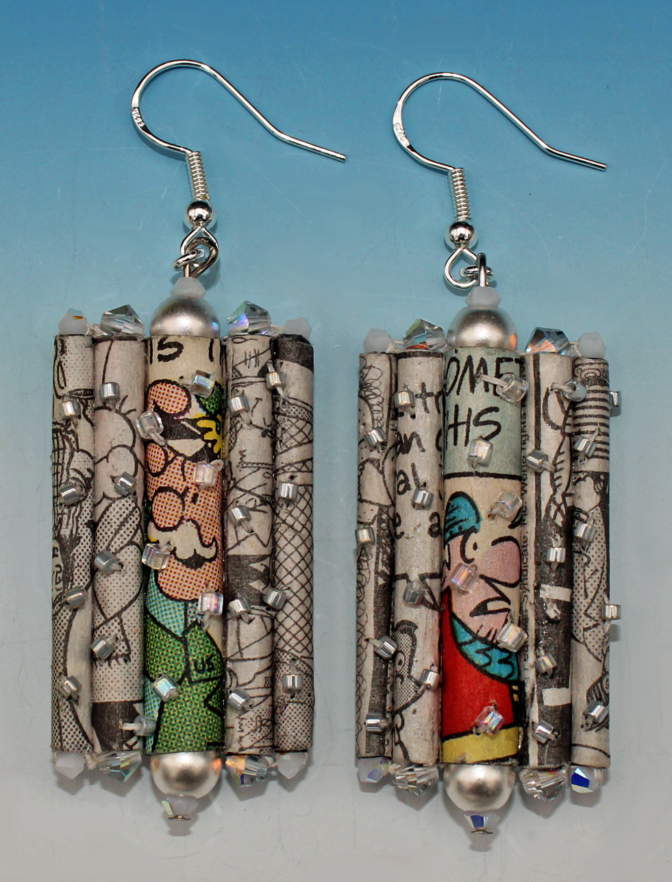 Newspaper jewellery on sale